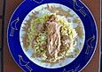 H&auml;hnchenbrustfilet auf Basmatireis an Erdnussbuttersauce