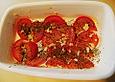 Limettenlachs auf Tomaten - Knoblauch - Bett