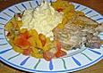Geschmorte Koteletts a la  pizzaiola mit Polenta