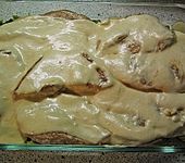 &Uuml;berbackene Putenschnitzel  auf Porreegem&uuml;se (Bild)