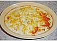 Pangasiusfilet auf Sauerkraut mit K&auml;se &uuml;berbacken