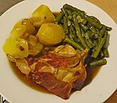Geschmorte Kaninchenkeulen (Bild)