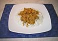 H&auml;hnchenfleisch mit fruchtiger Currysahnesauce auf Reis