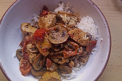 H&auml;hnchen mit Champignons und Tomaten