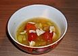 Gem&uuml;sesuppe mit H&uuml;hncheneinlage