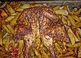 Plattes Huhn mit Kartoffelecken