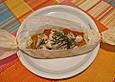 Aromahuhn mit Orangenm&ouml;hren in Pergament