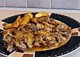 Gyros mit Metaxa - Sahne - Sauce &uuml;berbacken