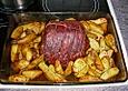 Schweinebraten vom Hals in Parmaschinken
