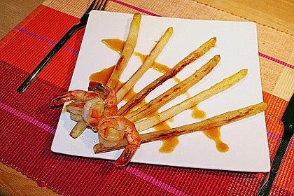 Gebratener Spargel mit Riesengarnelen und s&uuml;&szlig; - scharfer Passionsfrucht - Rum - Butter
