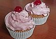 Schoko - Nuss - Cupcakes mit Kirsch - Meringue - Buttercreme