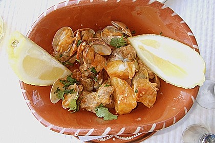 Schweinefleisch mit Muscheln