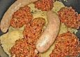 Leberkn&ouml;del auf Sauerkraut