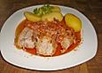 Putenoberkeule mit Speck und Zwiebeln