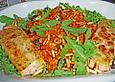 Risotto mit Tomate, Rucola, Pinienkernen und Oliven