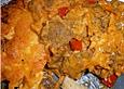 &Uuml;berbackenes D&ouml;ner in einer Paprikaso&szlig;e