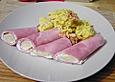Palmenmark in Schinkenscheiben mit Reissalat