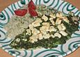 Pangasius im Reisbett mit Spinat und Feta &uuml;berbacken