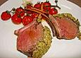Hirschrack mit Petersilien - Zitronenkruste und geschmolzenen Cocktailtomaten