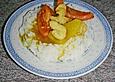 H&uuml;hnerfleisch mit Tomaten an einer Currysauce