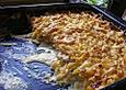 Putenschnitzel in K&auml;se - Lauch - Sauce mit R&ouml;sti &uuml;berbacken