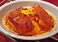 Paprikasauerkraut mit Fischfilet im Schinkenmantel
