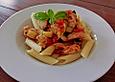 H&auml;hnchengeschnetzeltes mit Zucchini und frischen Tomatenst&uuml;cken