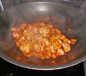 Scharfes Curryh&auml;hnchen  aus dem Wok mit Reis (Bild)
