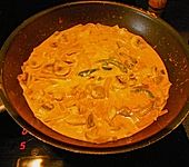 Scharfes Curryh&auml;hnchen  aus dem Wok mit Reis (Bild)