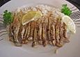 Anchovis mit Reis und Salat