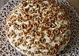 Aprikosen-Paradiescreme-Kuchen mit Knuspermandeldecke