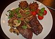 Champignons mit Speck und Zwiebeln