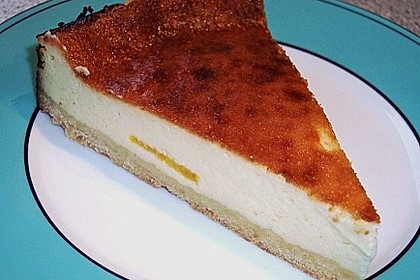 K&auml;sekuchen mit Orangensaft