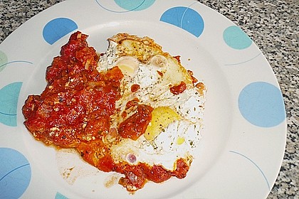 Eier in Tomatensugo 9