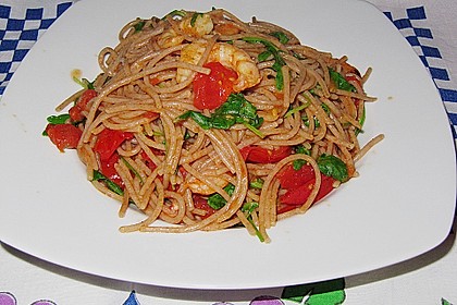 Spaghetti mit Rucola und Garnelen in Vanille-Tomaten