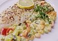 Pangasiusfilet an versch&auml;rftem Zitronen- Fr&uuml;hlingsgem&uuml;se mit Prosecco