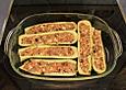 Gef&uuml;llte Zucchini mit Feta und Oliven