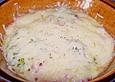 Spinat-Kartoffelb&auml;llchen in Tomatensauce, &uuml;berbacken