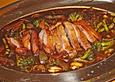 Gebackene Ente mit schwarzer Bohnensauce, scharf
