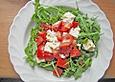 Gebackene Tomaten auf Rucola