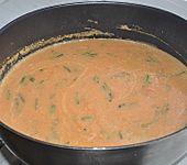Fruchtige orang-gr&uuml;ne K&uuml;rbissuppe (Bild)