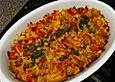 Auflauf mit Maisbrot, Paprika, Schinken, Mais