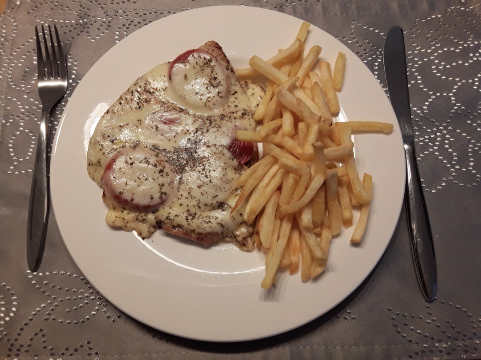Putenschnitzel mit Tomaten und Mozzarella überbacken (Rezept mit Bild ...