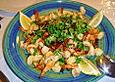 Pikant gebratene Scampi auf Feldsalat mit Orangenvinaigrette