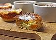K&auml;sekuchen-Muffins mit Pfirsich