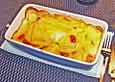 Kabeljaufilet auf Kartoffelgratin mit Senf - Safran Butter