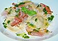 Steinpilzravioli mit Petersilienpesto, Parmesan und San Daniele Schinken