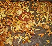 Steinpilzravioli mit Petersilienpesto, Parmesan und San Daniele Schinken (Bild)