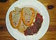 Gef&uuml;llte Paprikaschoten mit Zartweizen und Tomatengem&uuml;se