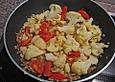 Dinkelpfanne mit Blumenkohl und Tomaten